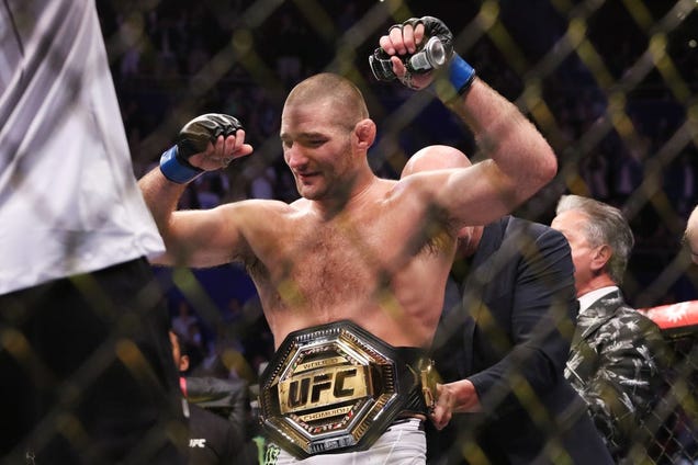 sean-strickland-grabs-middleweight-belt-at-ufc-293
